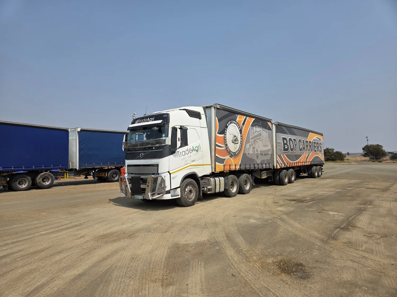 Volvo FH 520 hauling a BOP Carriers curtain-side trailer combination